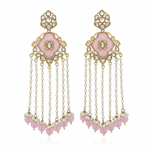 A pair of ornate gold-plated Indian chandelier earrings with pink stone centers, white faux pearl bead strands, and pink bead drops, displayed on a solid pink background.