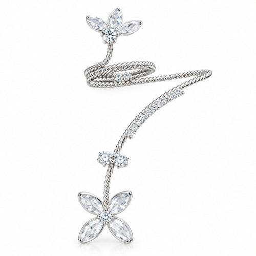 A silver-toned floral wire jewelry piece featuring two flower motifs and clear rhinestone accents, displayed on a solid dark burgundy background.